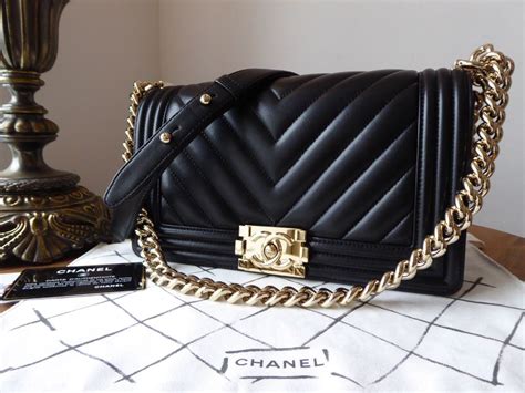 chanel chevron black gold